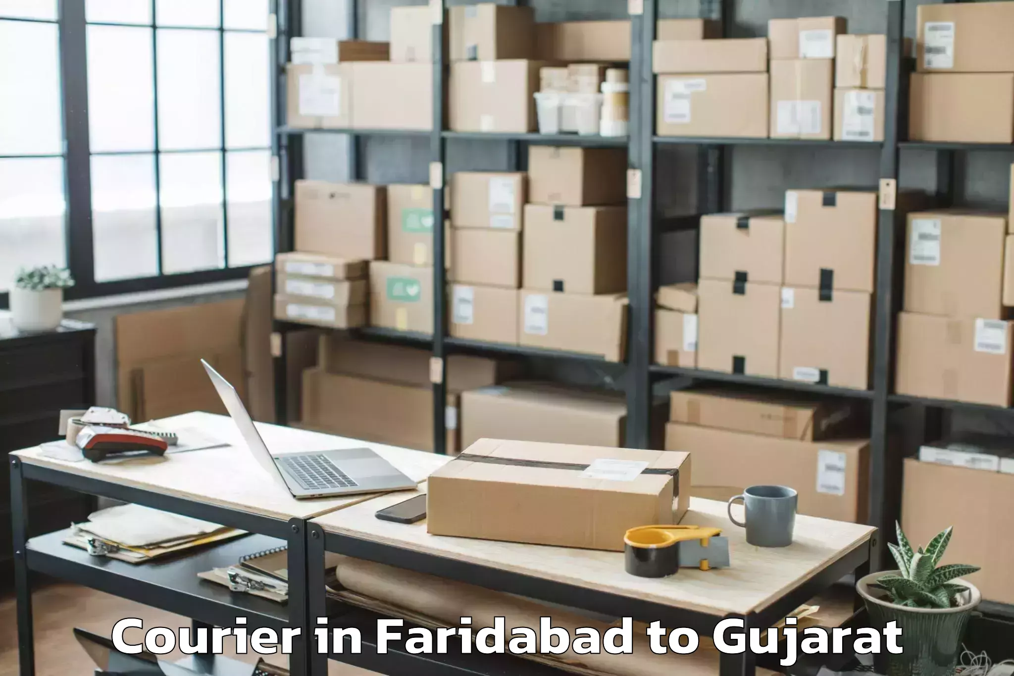 Get Faridabad to Modasa Courier